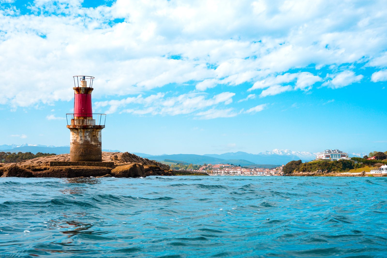 Like this steadfast little lighthouse guarding the shore, true love stands weathered yet unwavering, quietly guiding us home through every rising tide.