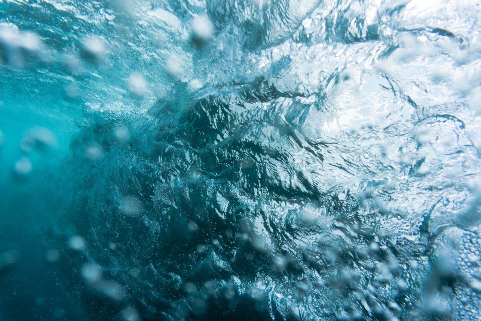 Beneath the churning surface, the ocean holds you gently—reminding us that even in life's turbulence, we're always cradled by something vast and loving.