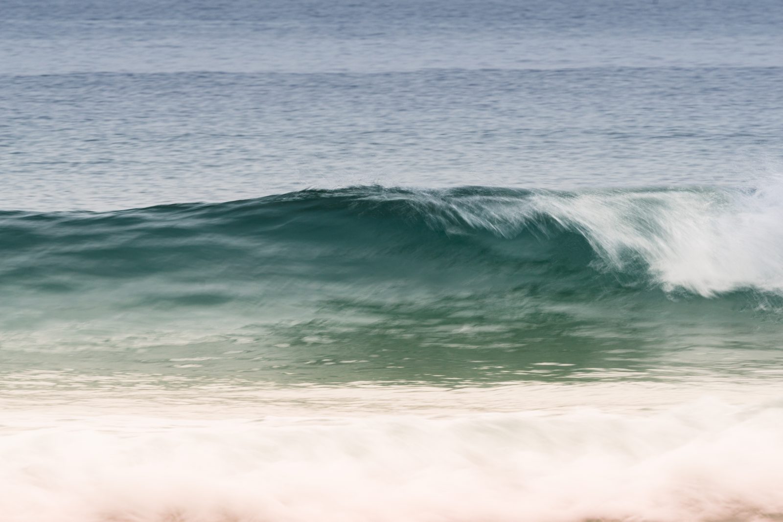 Like waves that rise and fall yet never leave the shore, true love returns again and again, gentle and constant.
