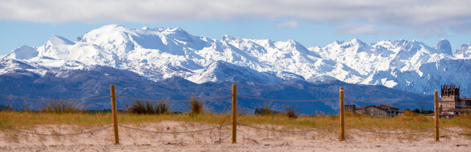 Between the sandy quiet and the mountains standing tall in the distance, there's a stillness that feels like being held—reminding us how far love can reach.