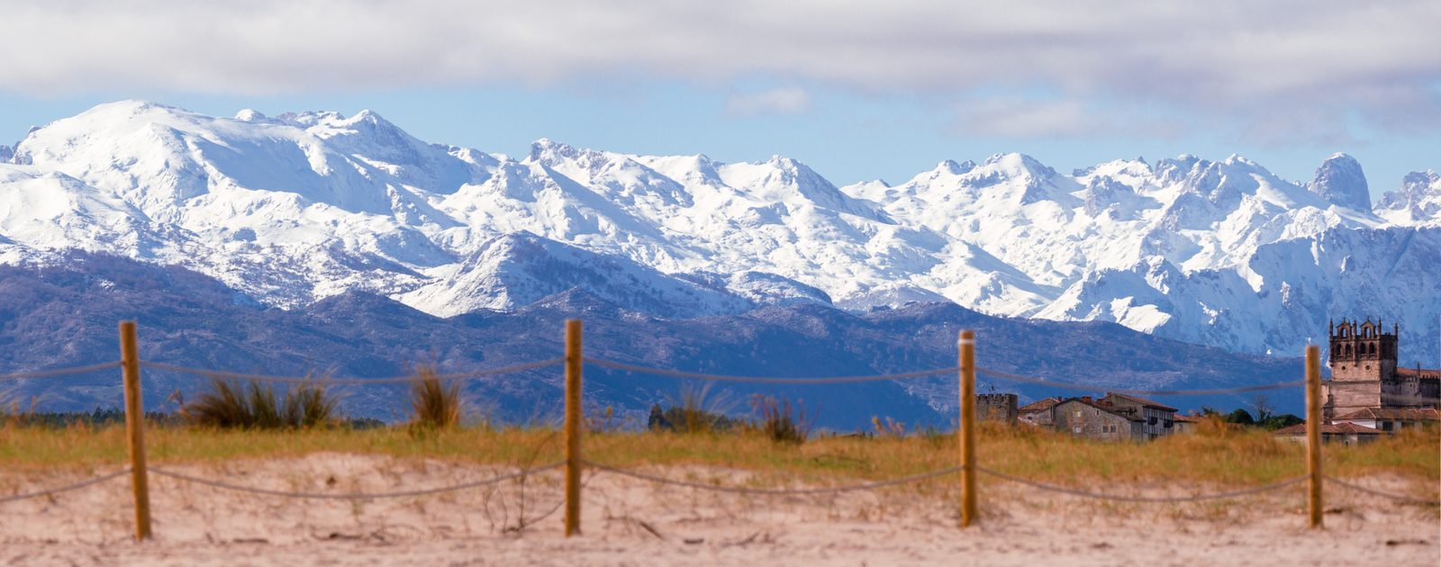 Even the vastness of snow-capped peaks can't outshine the quiet comfort of knowing someone is beside you, watching the same horizon.