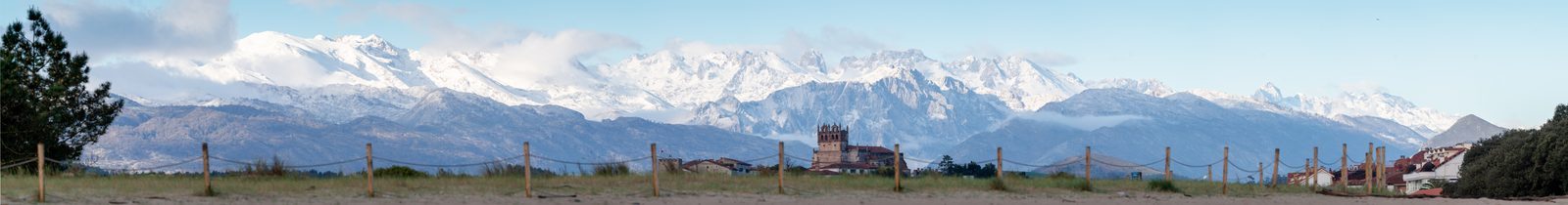 Beneath snow-capped peaks standing watch like old friends, a small village rests peacefully—reminding us that home is where the heart finds shelter.